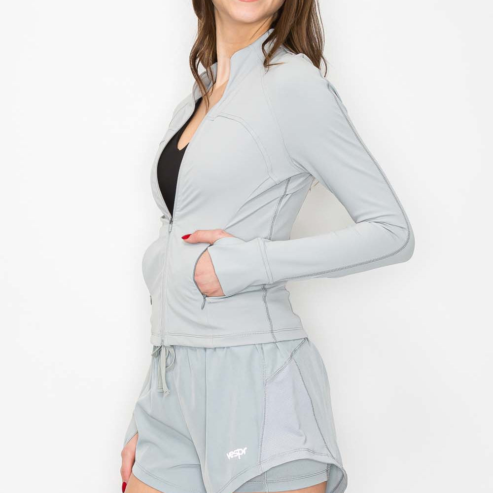 
                      
                        Contour Running Jacket - Smooth Silver - pocket angle
                      
                    