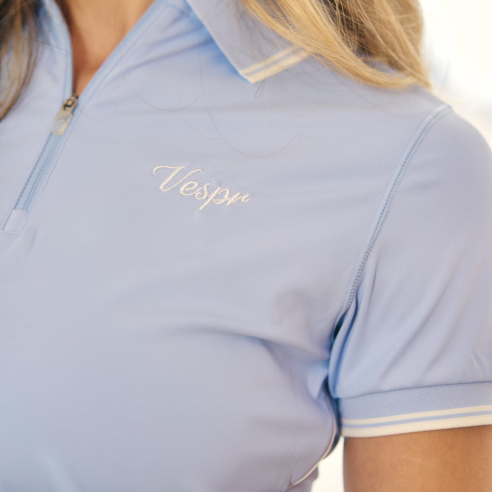 
                      
                        Colorblock 3/4 Zip Golf Polo with Side Slits and Logo Embroidery
                      
                    